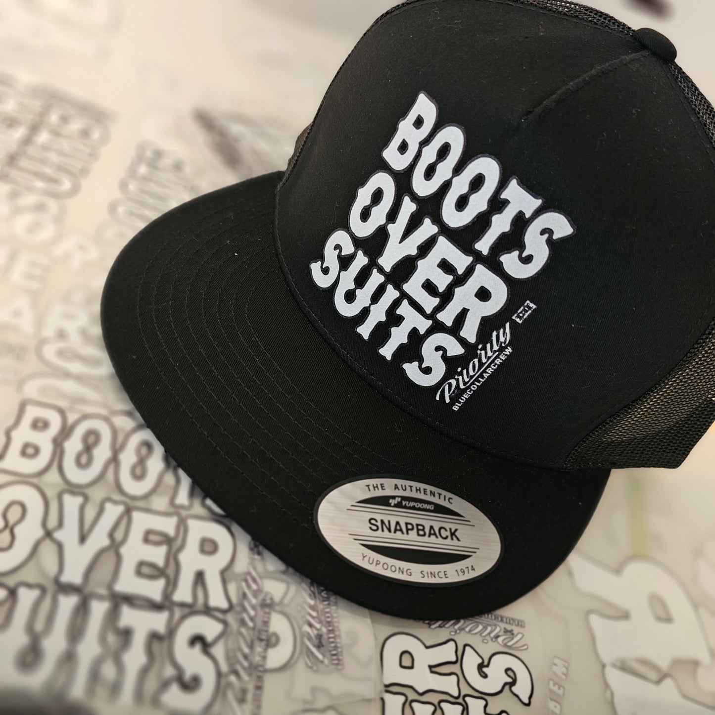 SNAPBACKS BOOTS OVER SUITS